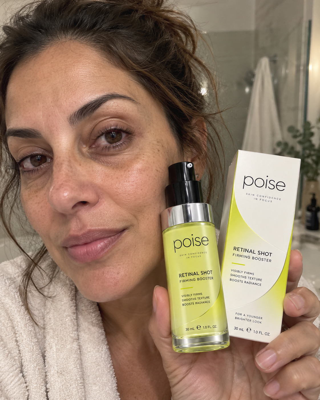 Sofia holding Poise Retinal Shot Firming Booster